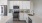 a kitchen with white cabinets