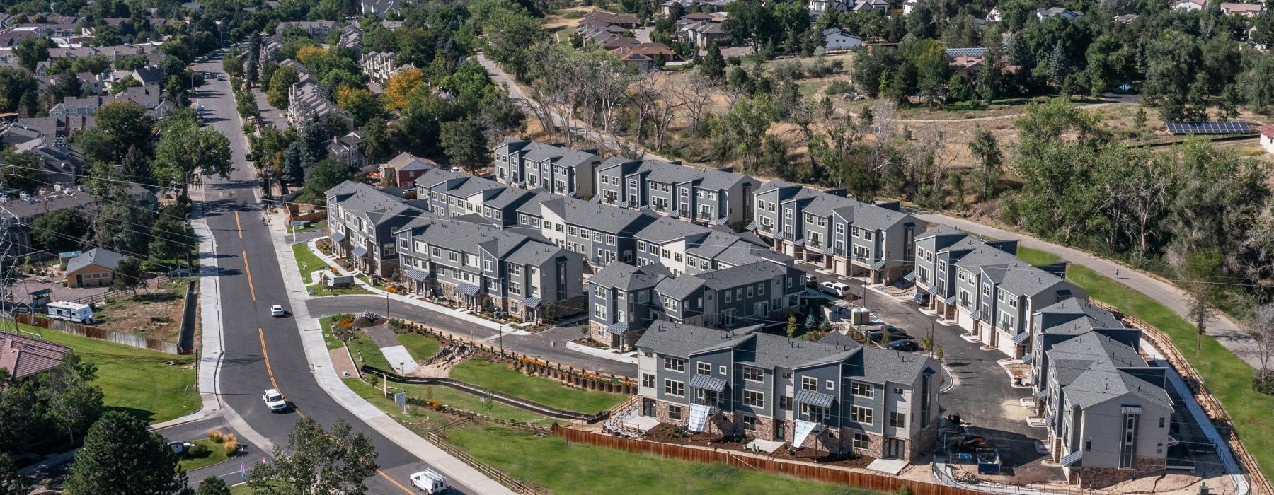 an aerial view of an apartment property