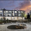 apartment buildings near a firepit